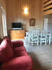 TV a/nebo společenská místnost v ubytování Augustine Appartement T3 Mezzanine