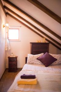 Ένα ή περισσότερα κρεβάτια σε δωμάτιο στο Pasika
