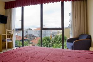 Postel nebo postele na pokoji v ubytování Hotel La Noyesa *** Superior