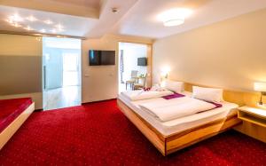 Panorama Hotel Traunstein客房内的一张或多张床位
