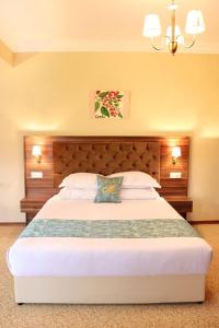 Кровать или кровати в номере Meryem's Hotel