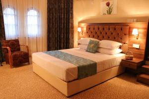 Кровать или кровати в номере Meryem's Hotel
