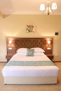 Кровать или кровати в номере Meryem's Hotel