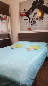 Posteľ alebo postele v izbe v ubytovaní Apartament Brenda Sibiu