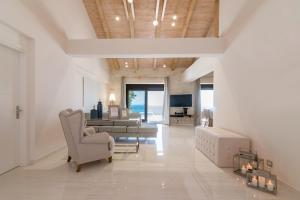 A seating area at Porto Vasilikos Villas