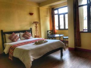 Ένα ή περισσότερα κρεβάτια σε δωμάτιο στο Hotel Yala Peak