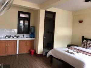Ένα ή περισσότερα κρεβάτια σε δωμάτιο στο Hotel Yala Peak