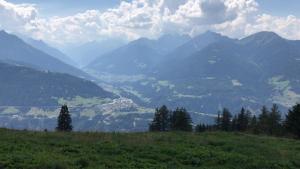 a view of a valley with mountains in the background at Appartement Tirolina in Innsbruck