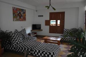 Televiisor ja/või meelelahutuskeskus majutusasutuses Sergeant Pepper's Hostel