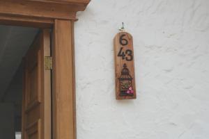 Majutusasutuses Sergeant Pepper's Hostel olev sertifikaat, autasu, silt või muu dokument