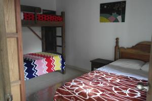 Voodi või voodid majutusasutuse Sergeant Pepper's Hostel toas