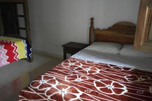Voodi või voodid majutusasutuse Sergeant Pepper's Hostel toas