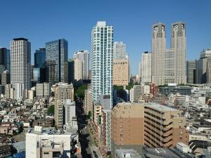 a view of a city with tall buildings at APA Hotel & Resort Nishishinjuku-Gochome-Eki Tower in Tokyo