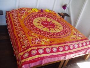 Voodi või voodid majutusasutuse El Momo Cottages toas
