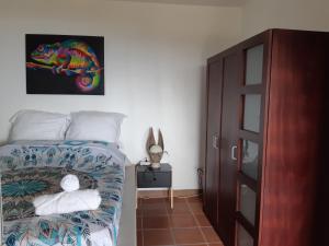 Ein Bett oder Betten in einem Zimmer der Unterkunft Domaine Choco Vanille