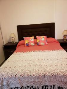 Кровать или кровати в номере Colón
