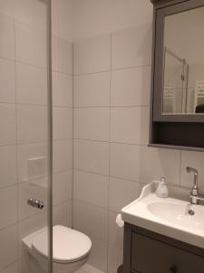 Ванная комната в Mirabelle - Wohnen in der Dresdner Neustadt