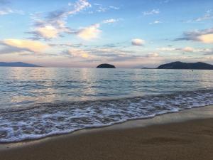 a view of the ocean with a sandy beach at Akti Hotel Kavala in Paleo Tsifliki