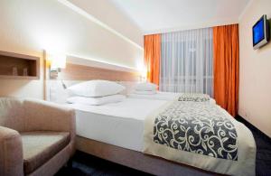 Posteľ alebo postele v izbe v ubytovaní Comfort by Trio