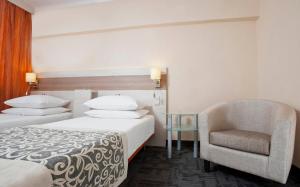 Posteľ alebo postele v izbe v ubytovaní Comfort by Trio