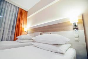 Posteľ alebo postele v izbe v ubytovaní Comfort by Trio