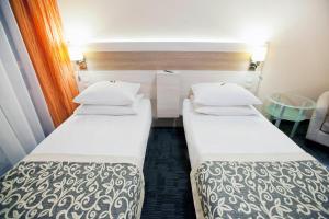 Posteľ alebo postele v izbe v ubytovaní Comfort by Trio