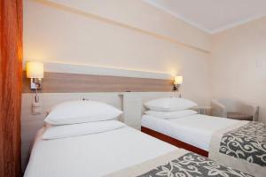 Posteľ alebo postele v izbe v ubytovaní Comfort by Trio