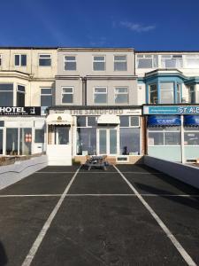 an empty parking lot in front of a building at Sandford Promenade in Blackpool