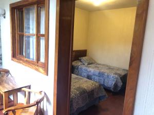 Postel nebo postele na pokoji v ubytování Posada De Los Volcanes