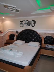 Giường trong phòng chung tại Motel Morumbi (Adults Only)