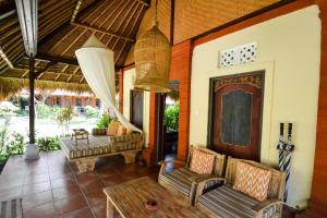 Area soggiorno di Taman Sari Bali Resort and Spa