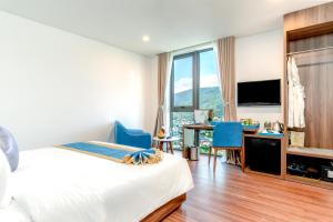TV a/nebo společenská místnost v ubytování Grand Gold Beach Hotel & Spa