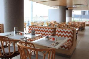 Χώρος καθιστικού στο HARRIS Hotel & Conventions Solo