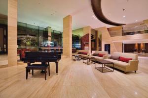 Posezení v ubytování de Vins Sky Hotel Seminyak
