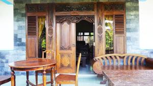 Un lugar para sentarse en Jeru Homestay