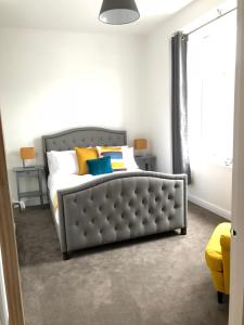 En eller flere senger på et rom på Dryburgh Apartment No3