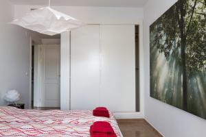 Posteľ alebo postele v izbe v ubytovaní Puerta del Mar + 28 fotografií