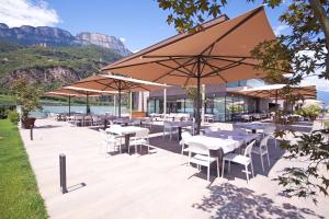A restaurant or other place to eat at The Lodge Sporthotel - Golfclub Eppan