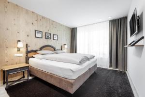Postel nebo postele na pokoji v ubytování Apart am Sonnenhügel