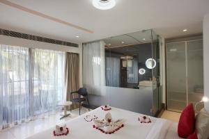 Кровать или кровати в номере Fahrenheit Hotels & Resorts