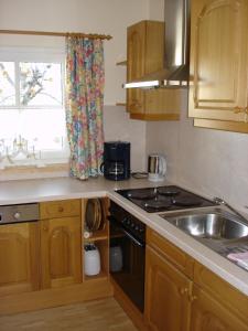 Küche/Küchenzeile in der Unterkunft Appartements Ferienwohnungen Alpenblick