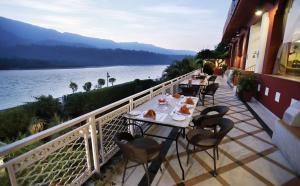 A balcony or terrace at GANGA KINARE- A Riverside Boutique Resort, Rishikesh