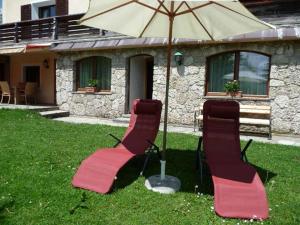 Ein Garten an der Unterkunft Appartements Ferienwohnungen Alpenblick