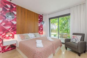 A bed or beds in a room at Villa Diagonal