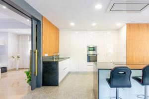 A kitchen or kitchenette at Villa Diagonal