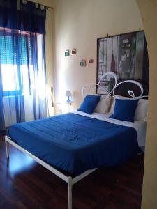 Postel nebo postele na pokoji v ubytování La Suite Sul Corso