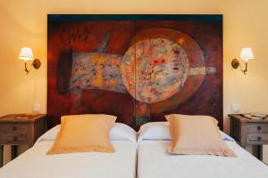 Postel nebo postele na pokoji v ubytování La Aldea Colorada Casa Rural