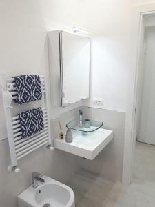 Koupelna v ubytování Appartamento "Un Bacio sul Mare"