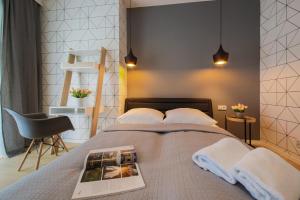 Posteľ alebo postele v izbe v ubytovaní Boogie Apartments