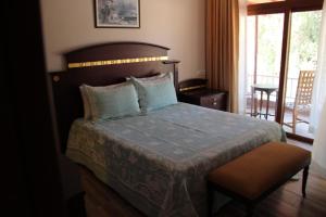 Voodi või voodid majutusasutuse Adrasan La Casita Hotel toas